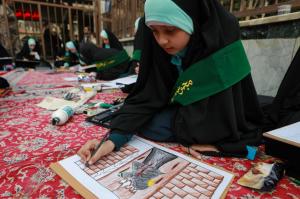 Students participate in art exhibition within festival of Fatimi season of Sorrows in Karbala