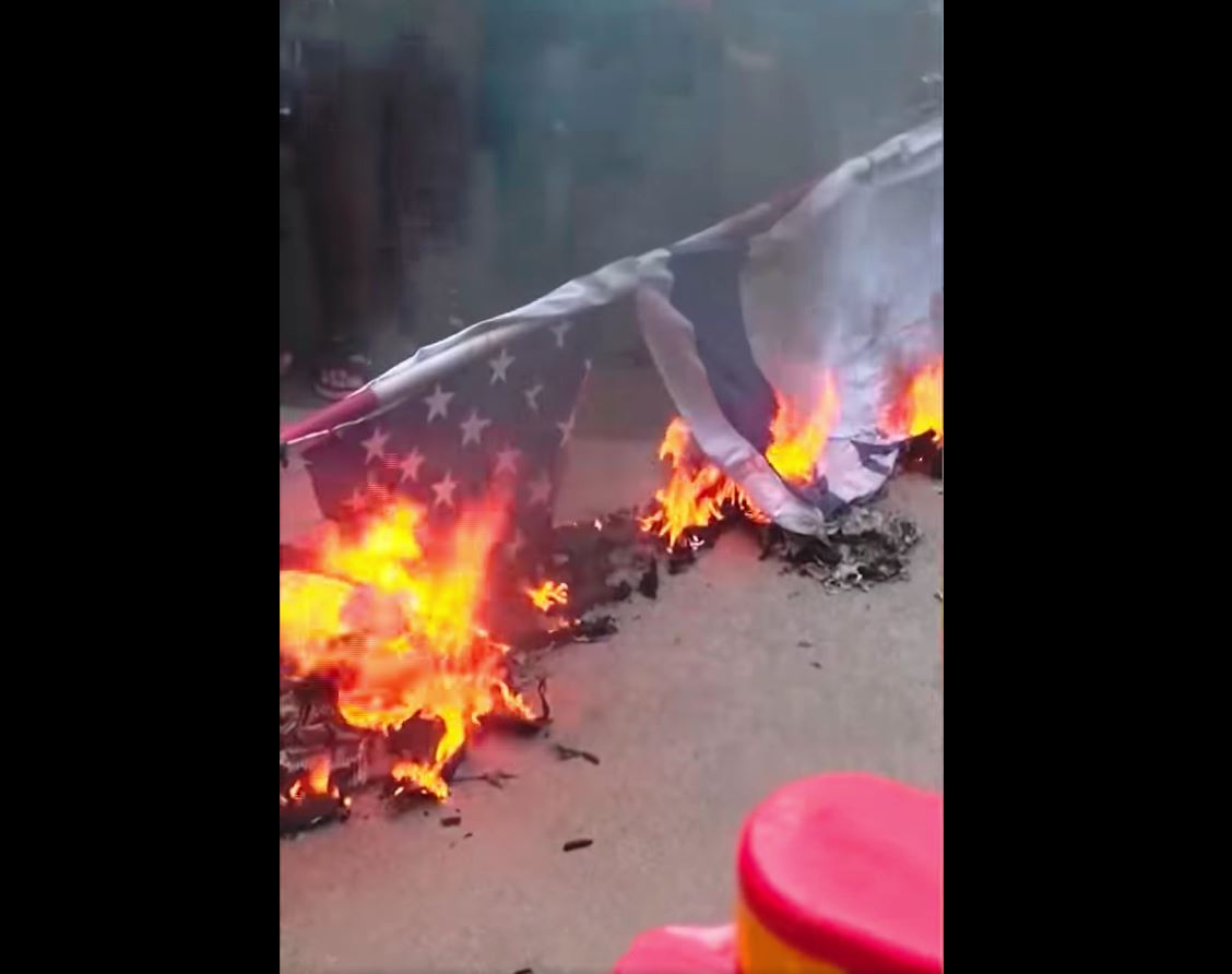 Video: Pro-Palestinian supporters set fire to US and Israeli flags outside  US embassy in Jakarta, Indonesia